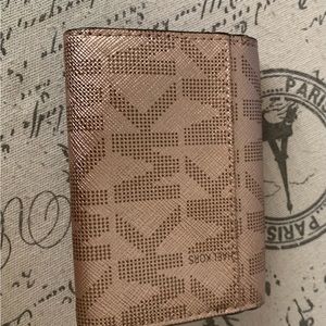 Michael Kors small wallet, excellent condition, used once or twice.
